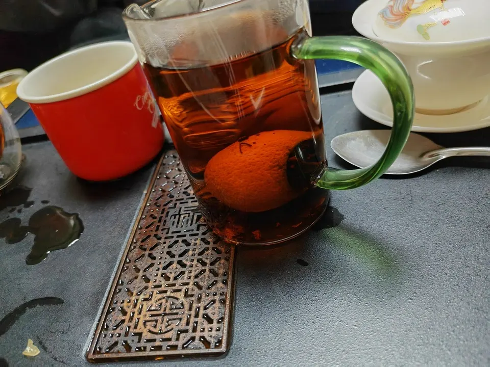 8 years of Xinhui XiaoQingGan Chenpi Pu'er Tea (Ripe Tea) photo review