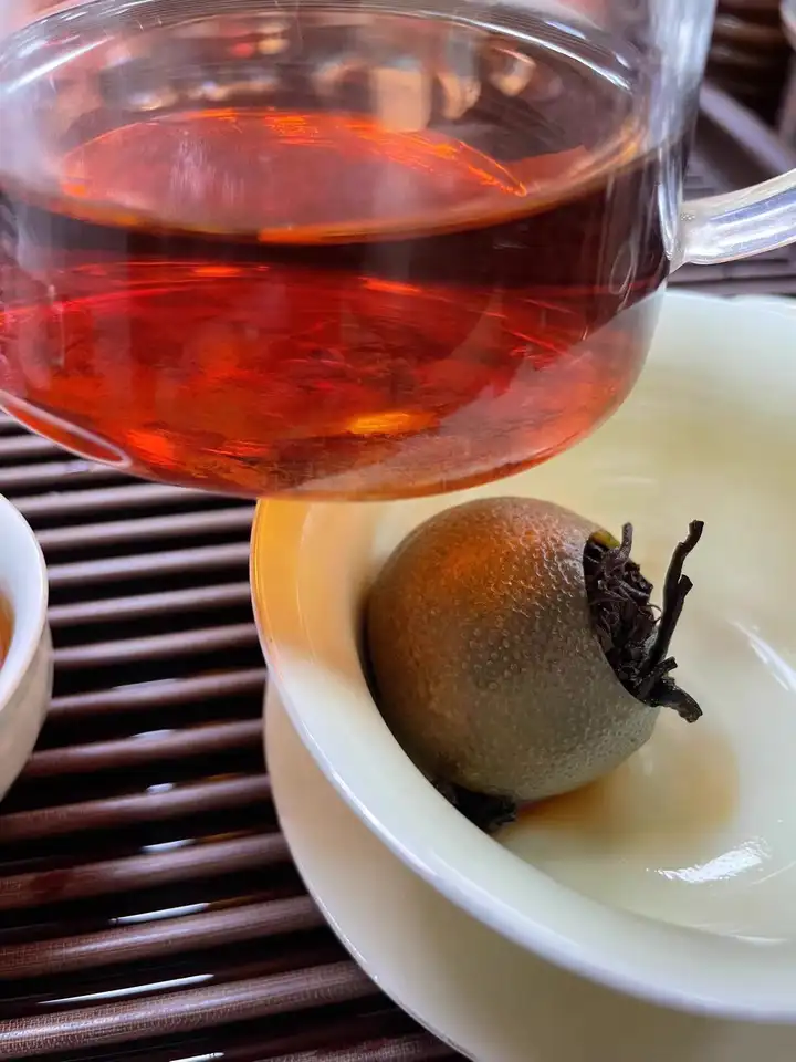 8 years of Xinhui XiaoQingGan Chenpi Pu'er Tea (Ripe Tea) photo review