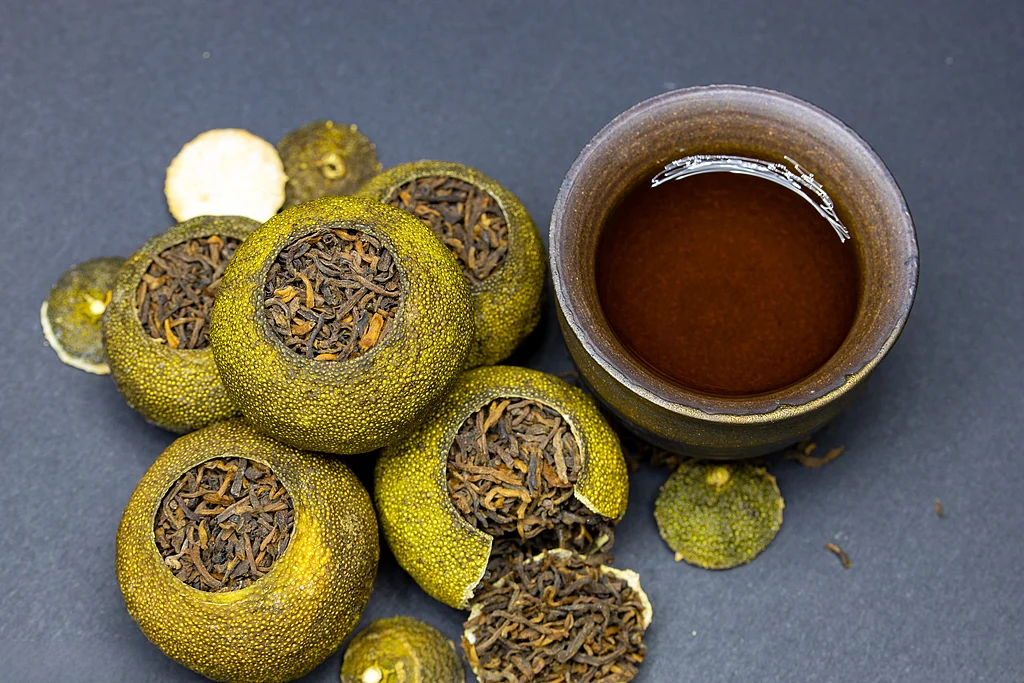 xiao qing gan green mandarin peel with puerh tea